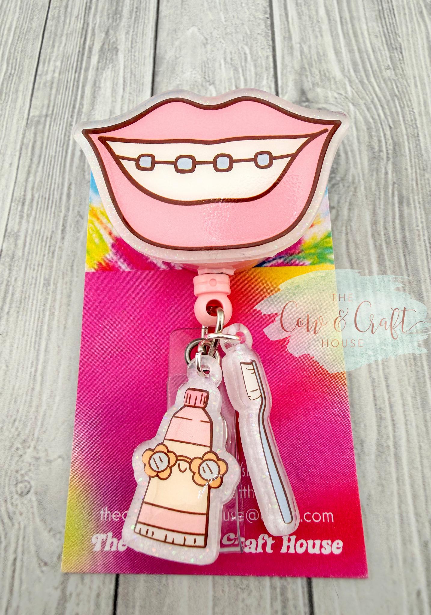 Dental Assistant Badge Reel Hygienist Badge Reel w/ Braces Smile, Toothbrush & Toothpaste Charms, 34” Nylon Cord Swivel Clip